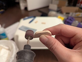 Grinding down the edges to match the marked area