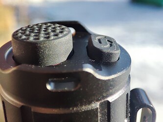 Raised main forward switch and a smaller strobe switch.