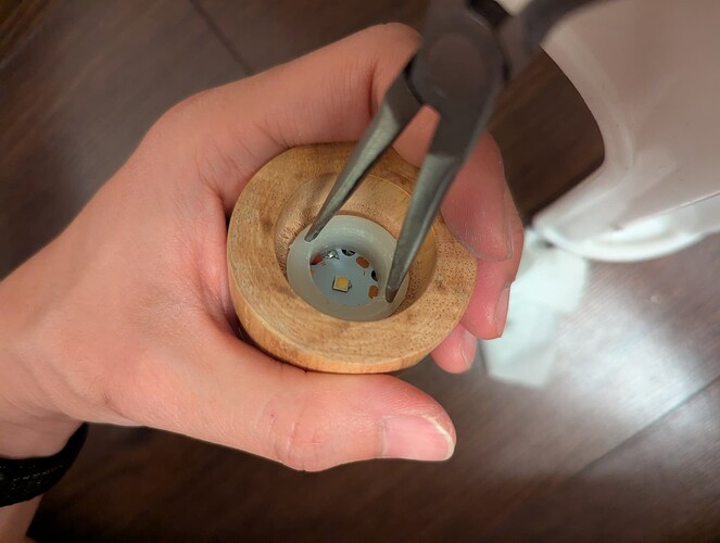 Screwing the cap into place...