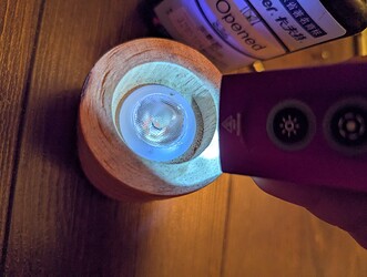 Gluing the optic to finish off the head.