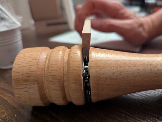 This wood strip is juuuust a bit too wide, but I can make it fit.