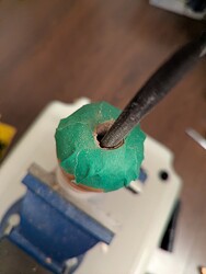 Filing the edges for a smoother, more consistent shape.