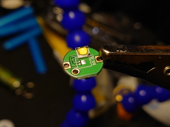 Stock LED next to its footprint